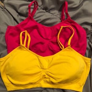 Pink and yellow sports bras